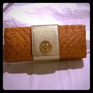 Tory Burch wicker clutch.